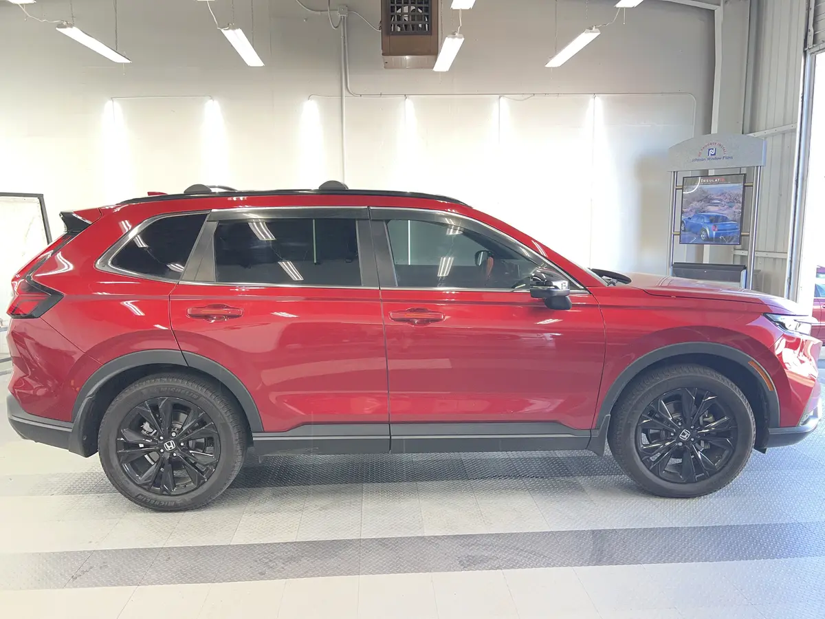 Red Honda CR-V after Avery Dennison Encore Supreme ceramic window tint (view 2)