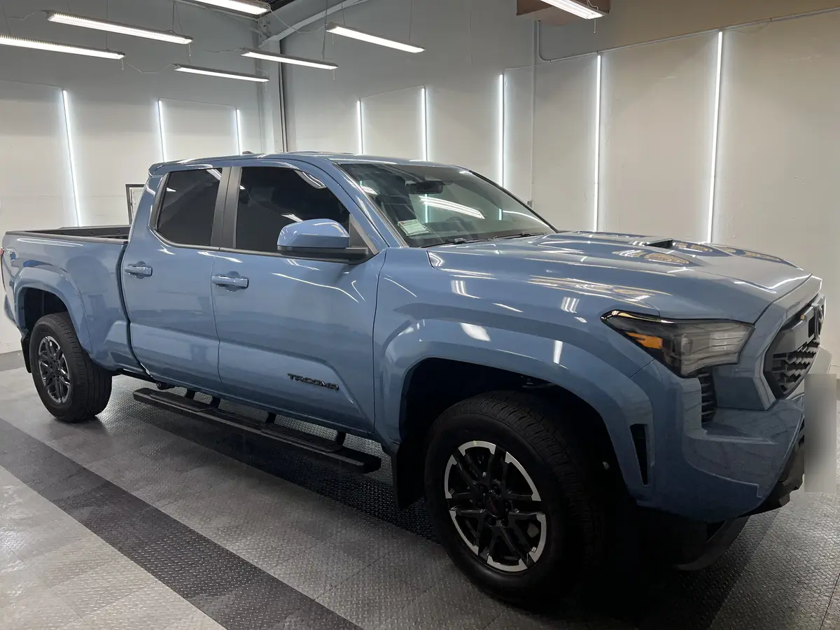 Blue Toyota Tacoma after Avery Dennison Encore Supreme ceramic window tint (view 3)