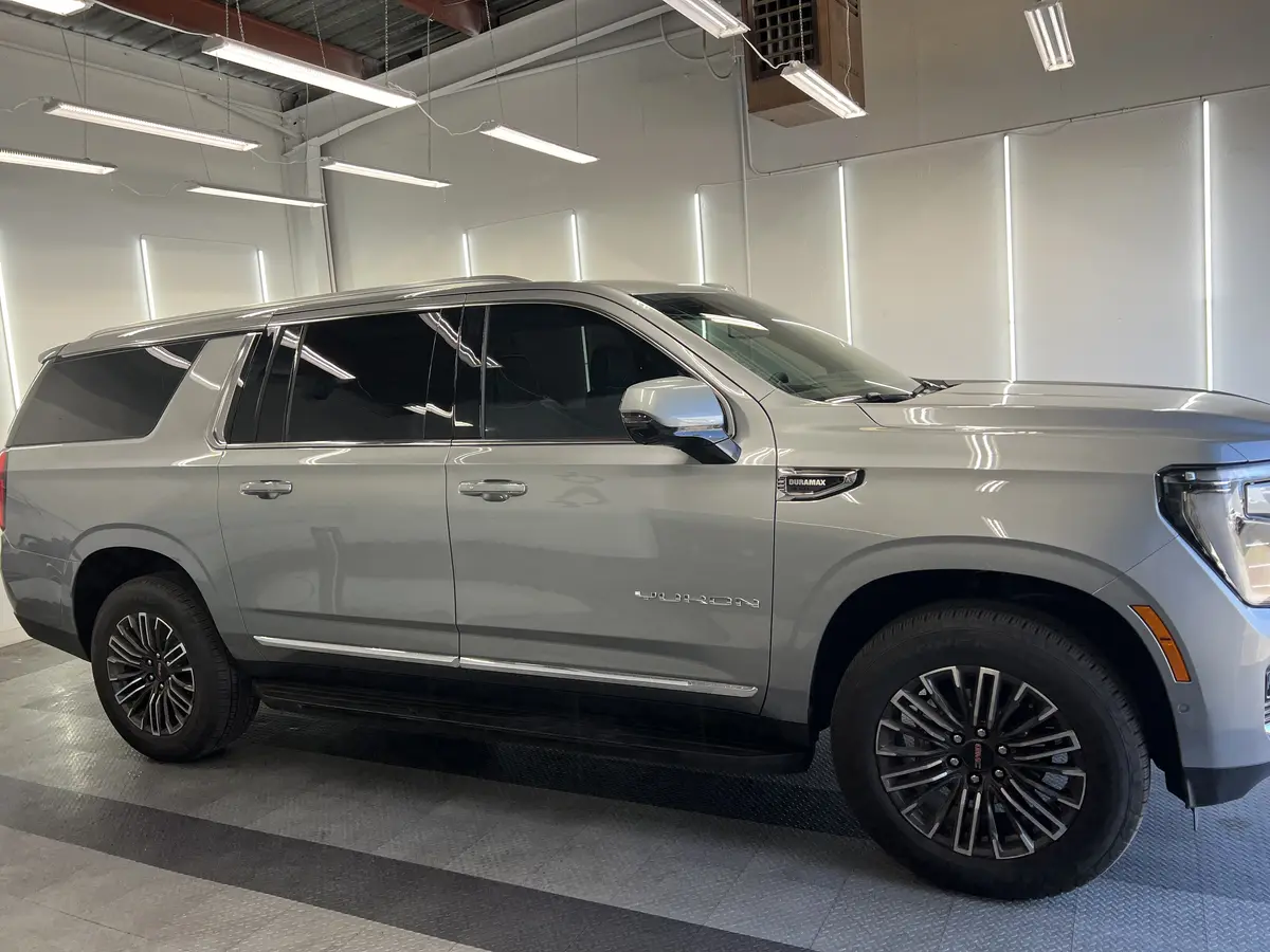 Silver GMC Yukon after Avery Dennison Encore Supreme ceramic window tint (view 1)