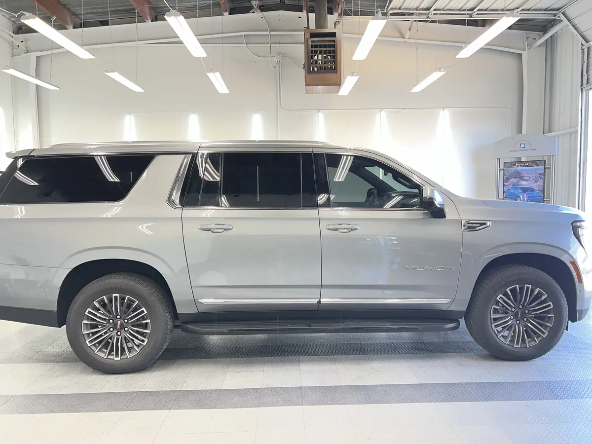 Silver GMC Yukon after Avery Dennison Encore Supreme ceramic window tint (view 2)