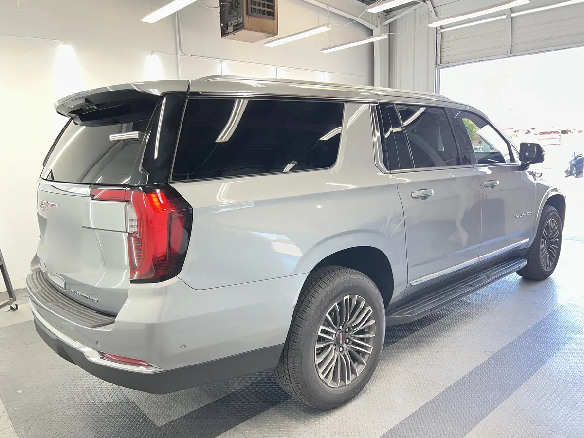 Silver GMC Yukon after Avery Dennison Encore Supreme ceramic window tint (view 3)