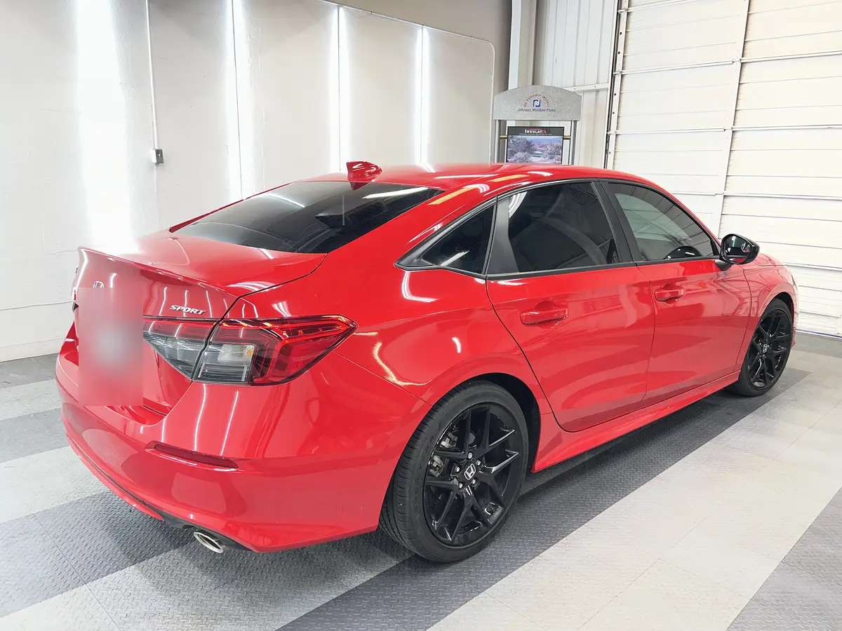 Red Honda Civic after Avery Dennison Encore Supreme ceramic window tint (view 3)