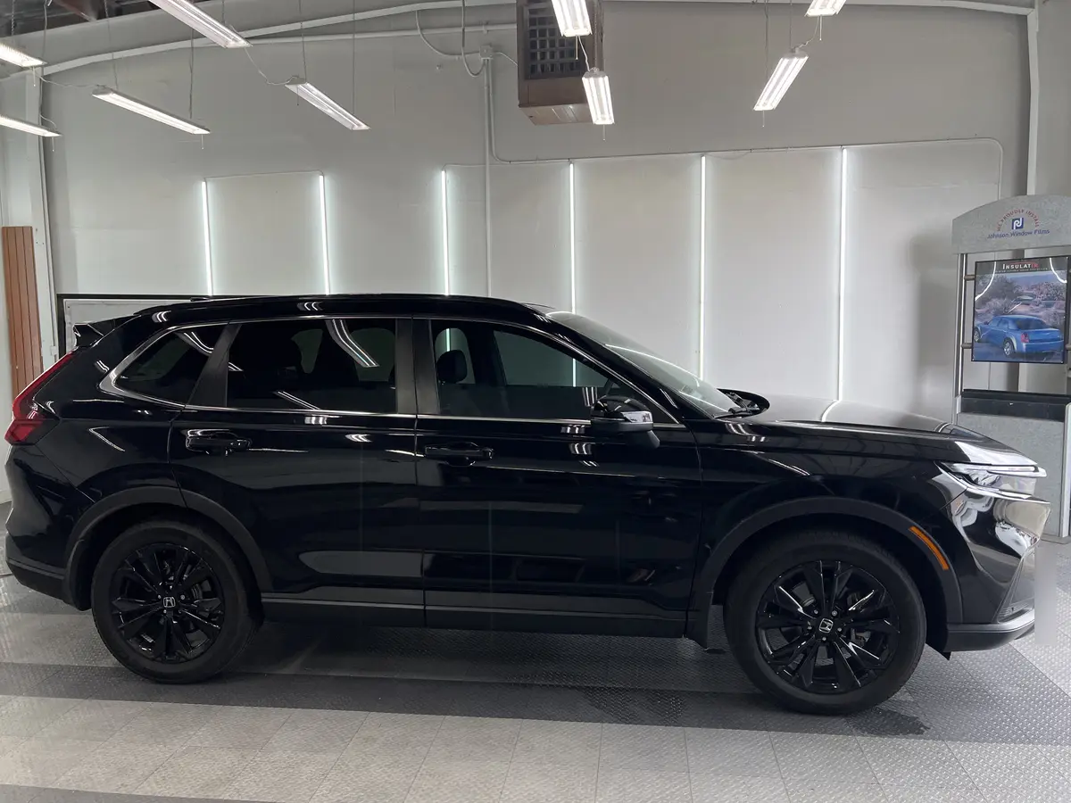 Black Honda CR-V after Avery Dennison Encore Supreme ceramic window tint (view 1)