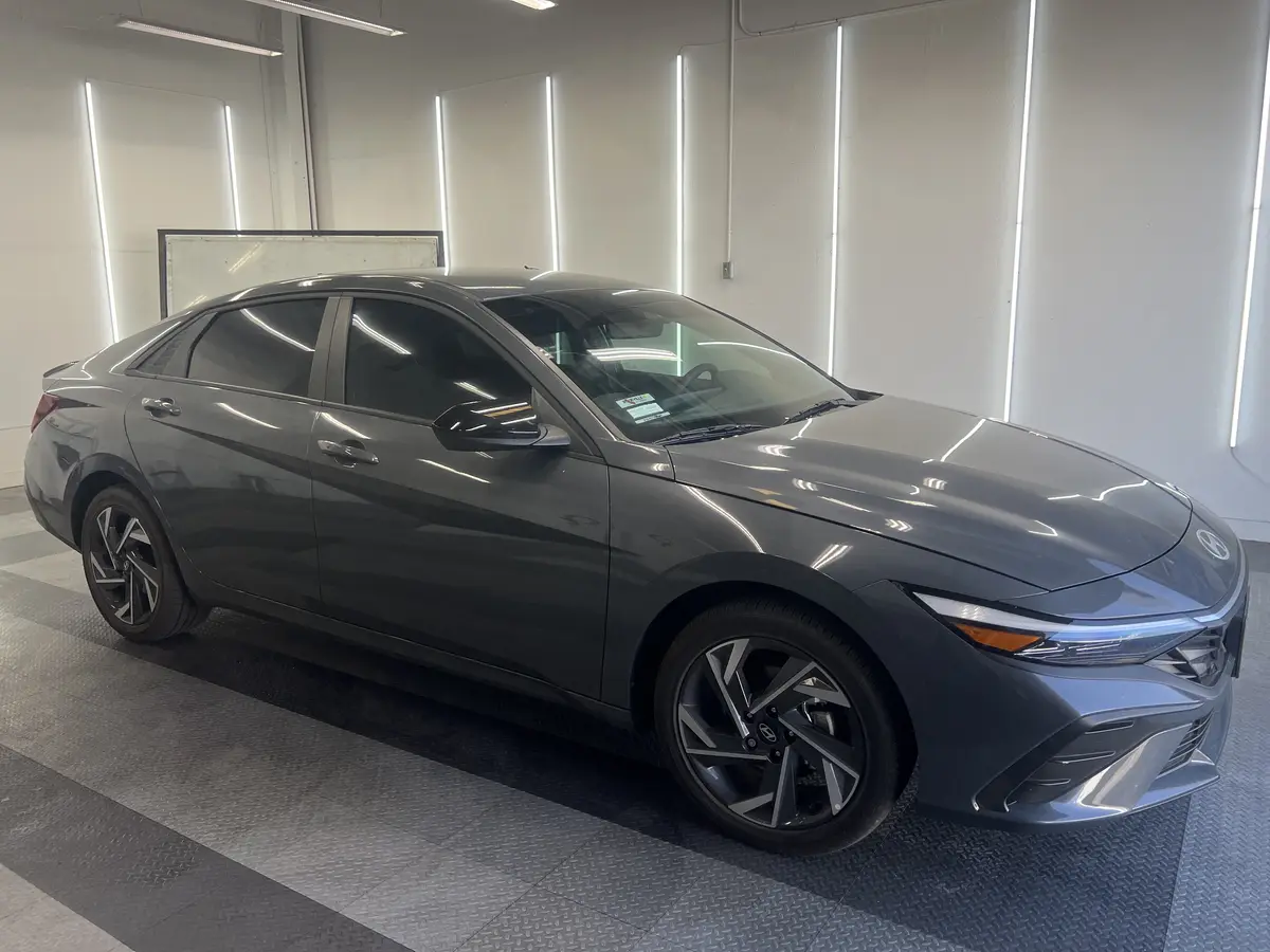 Gray Hyundai Elantra after Avery Dennison Encore carbon window tint (view 1)