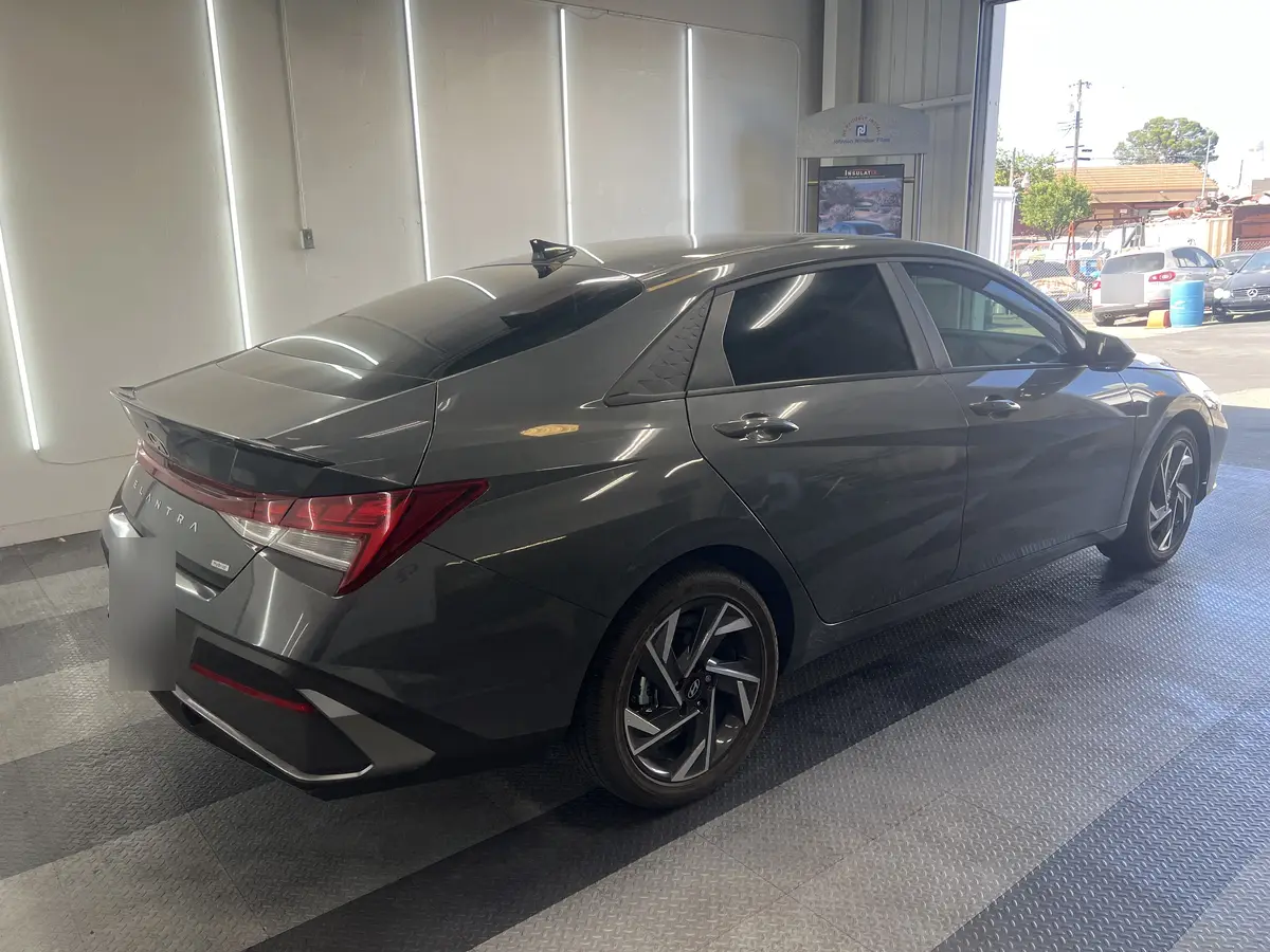 Gray Hyundai Elantra after Avery Dennison Encore carbon window tint (view 2)