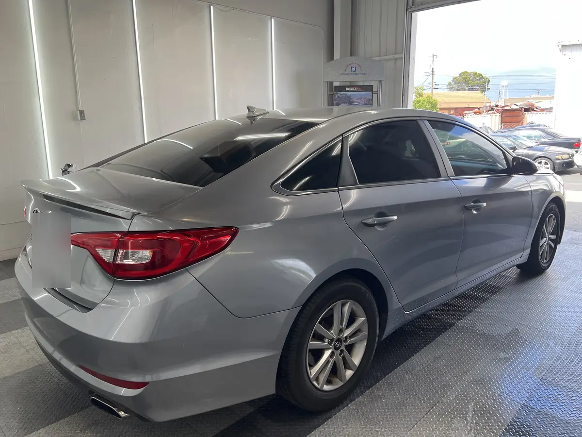 Silver Hyundai Sonata at Quality Window Tinting, carbon window tint job (photo 1)