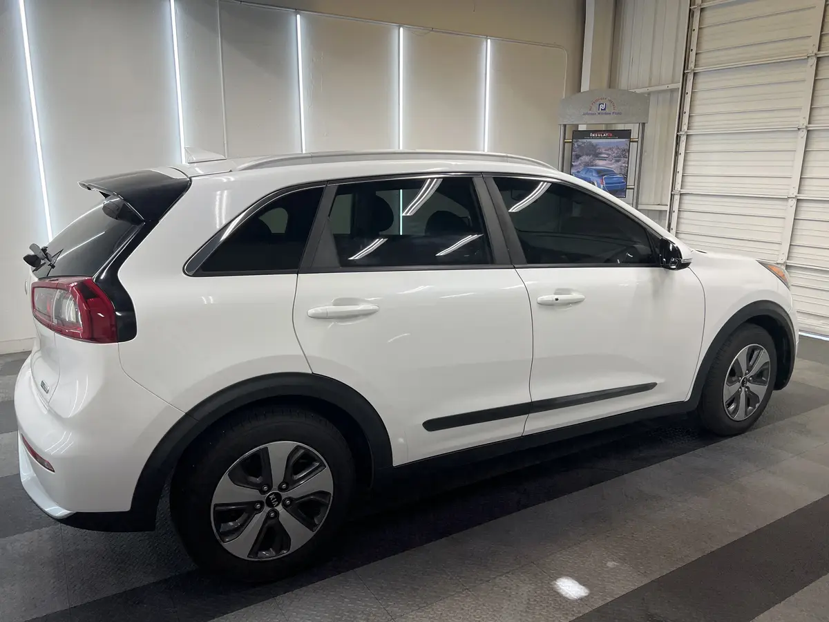 White Kia Niro after Avery Dennison Encore Supreme ceramic window tint (view 3)