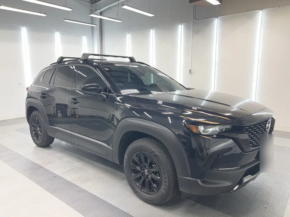 Black Mazda CX-50 after Avery Dennison Encore Supreme ceramic window tint (view 1)