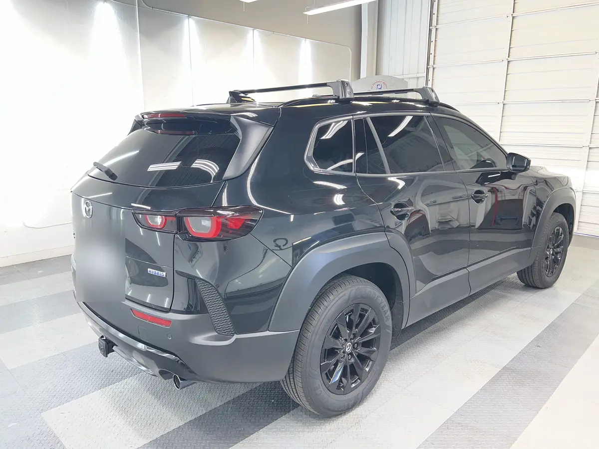 Black Mazda CX-50 after Avery Dennison Encore Supreme ceramic window tint (view 3)