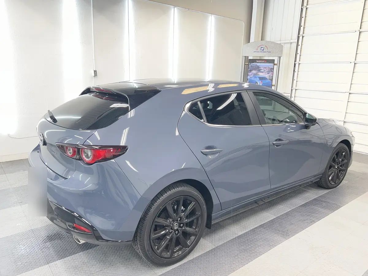 Gray Mazda Mazda3 after Avery Dennison Encore Supreme ceramic window tint (view 1)