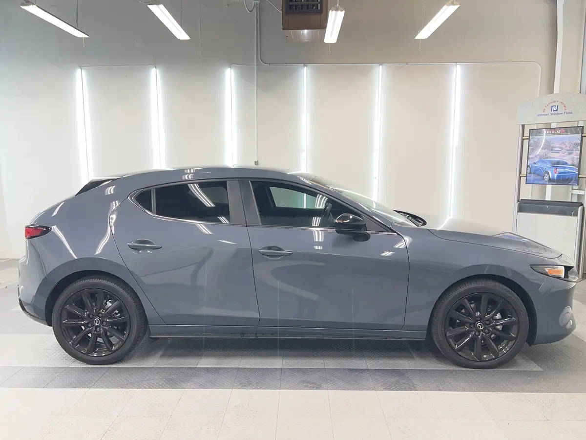 Gray Mazda Mazda3 after Avery Dennison Encore Supreme ceramic window tint (view 2)