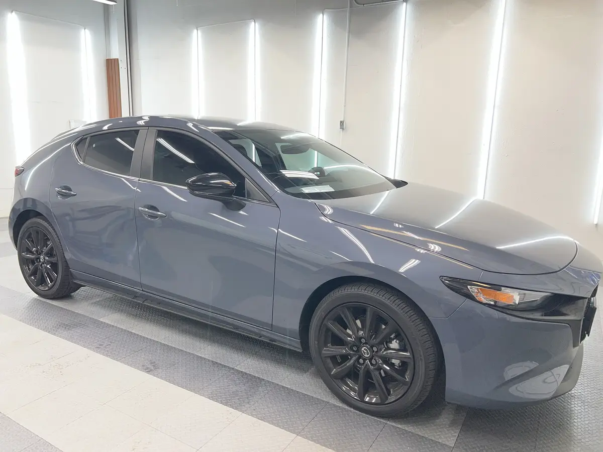Gray Mazda Mazda3 after Avery Dennison Encore Supreme ceramic window tint (view 3)