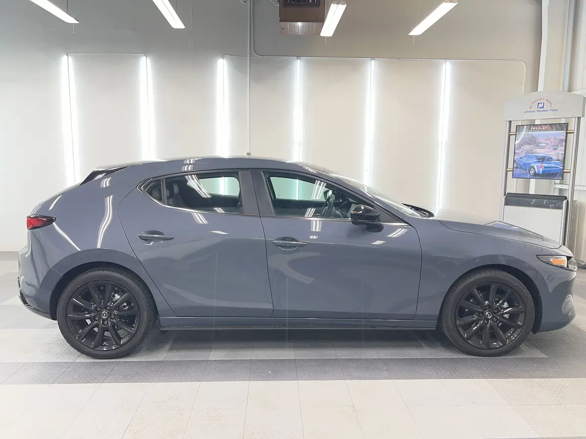 Gray Mazda Mazda3 before window tinting, factory glass (view 2)