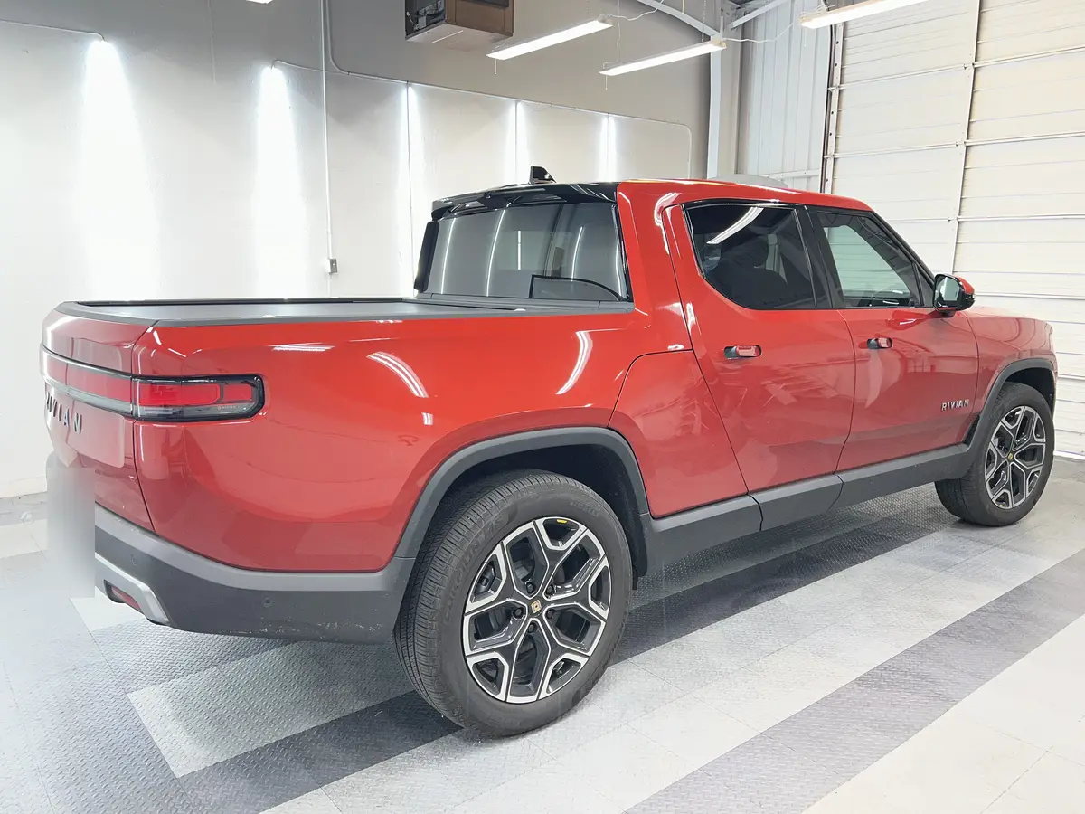 Red Rivian R1T after Avery Dennison Encore Supreme ceramic window tint (view 3)
