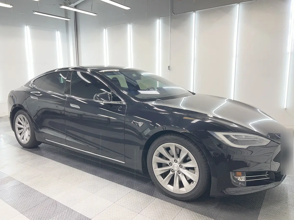 Black Tesla Model S after Avery Dennison Encore Supreme ceramic window tint (view 1)