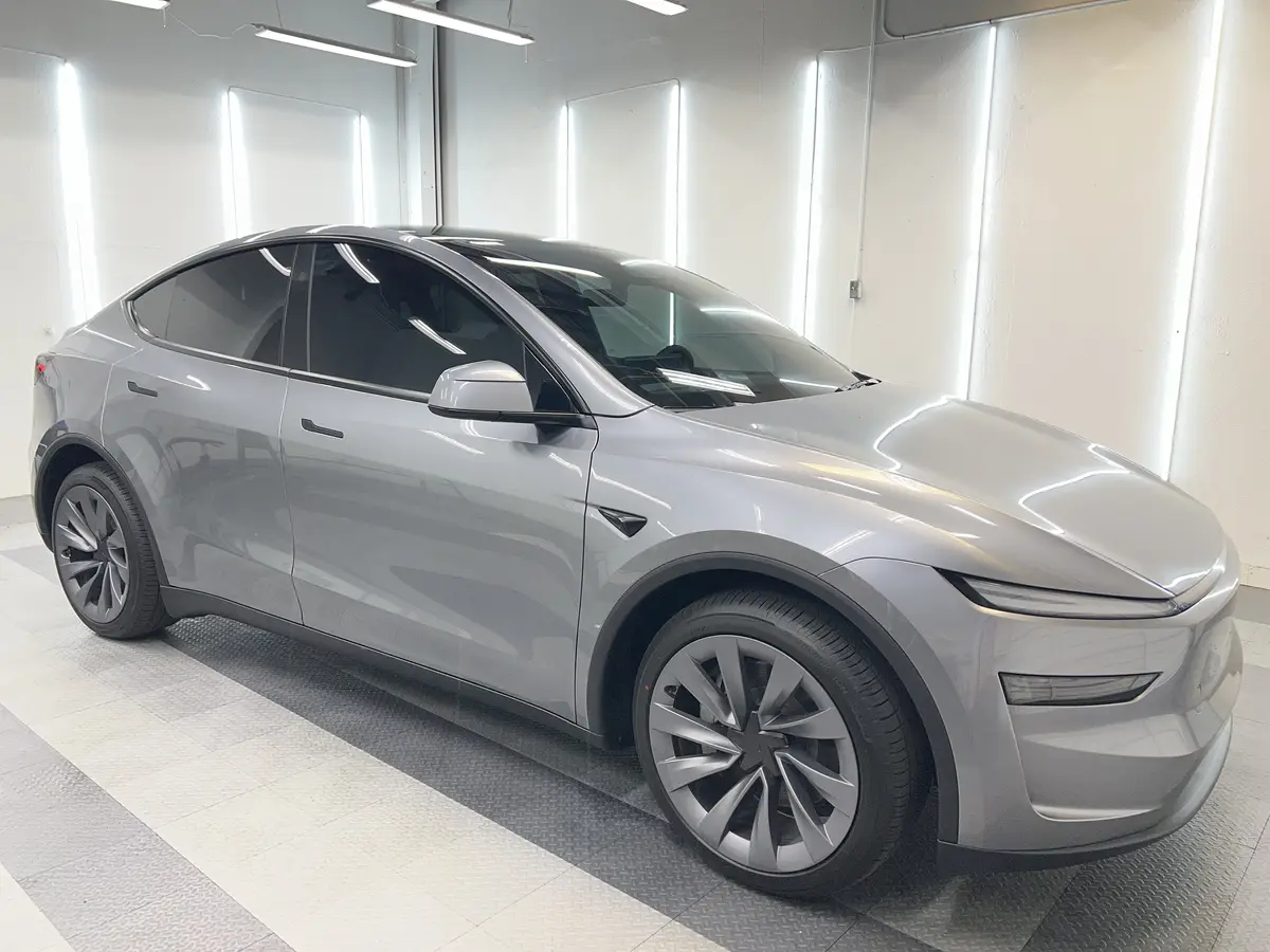 Gray Tesla Model Y after Avery Dennison Encore Supreme ceramic window tint (view 1)