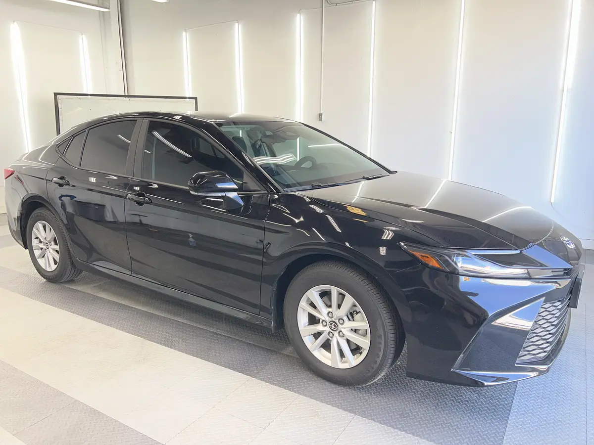 Black Toyota Camry after Avery Dennison Encore Supreme ceramic window tint (view 1)