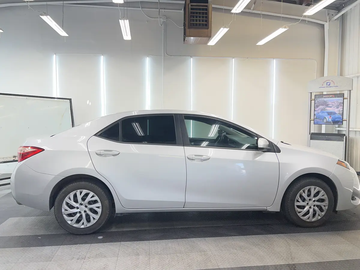 Silver Toyota Corolla after Avery Dennison Encore Supreme ceramic window tint (view 2)