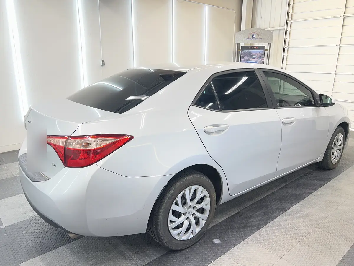 Silver Toyota Corolla after Avery Dennison Encore Supreme ceramic window tint (view 3)