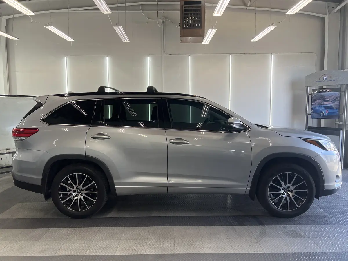 Silver Toyota Highlander after Avery Dennison Encore Supreme ceramic window tint (view 1)