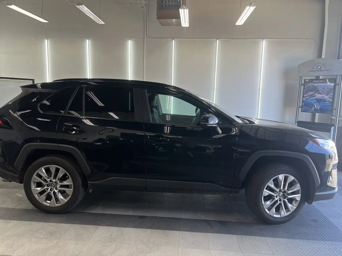 Black Toyota RAV4 after Avery Dennison Encore Supreme ceramic window tint (view 2)