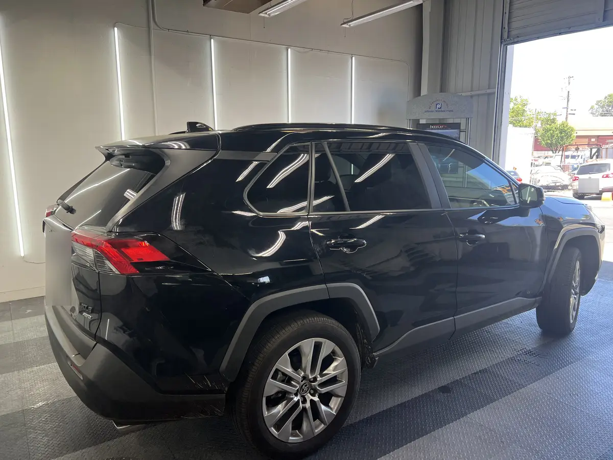 Black Toyota RAV4 after Avery Dennison Encore Supreme ceramic window tint (view 3)