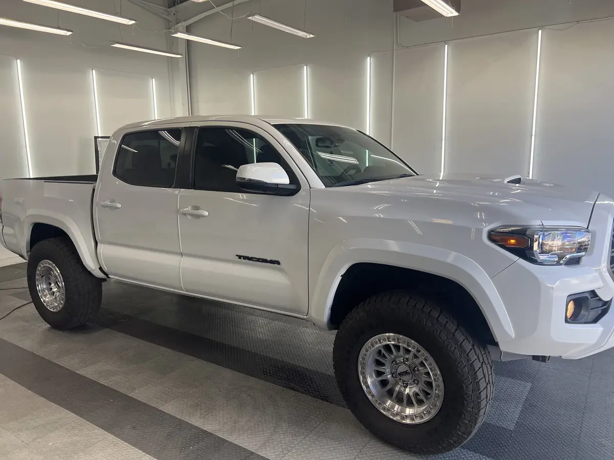 White Toyota Tacoma after Avery Dennison Encore Supreme ceramic window tint (view 1)