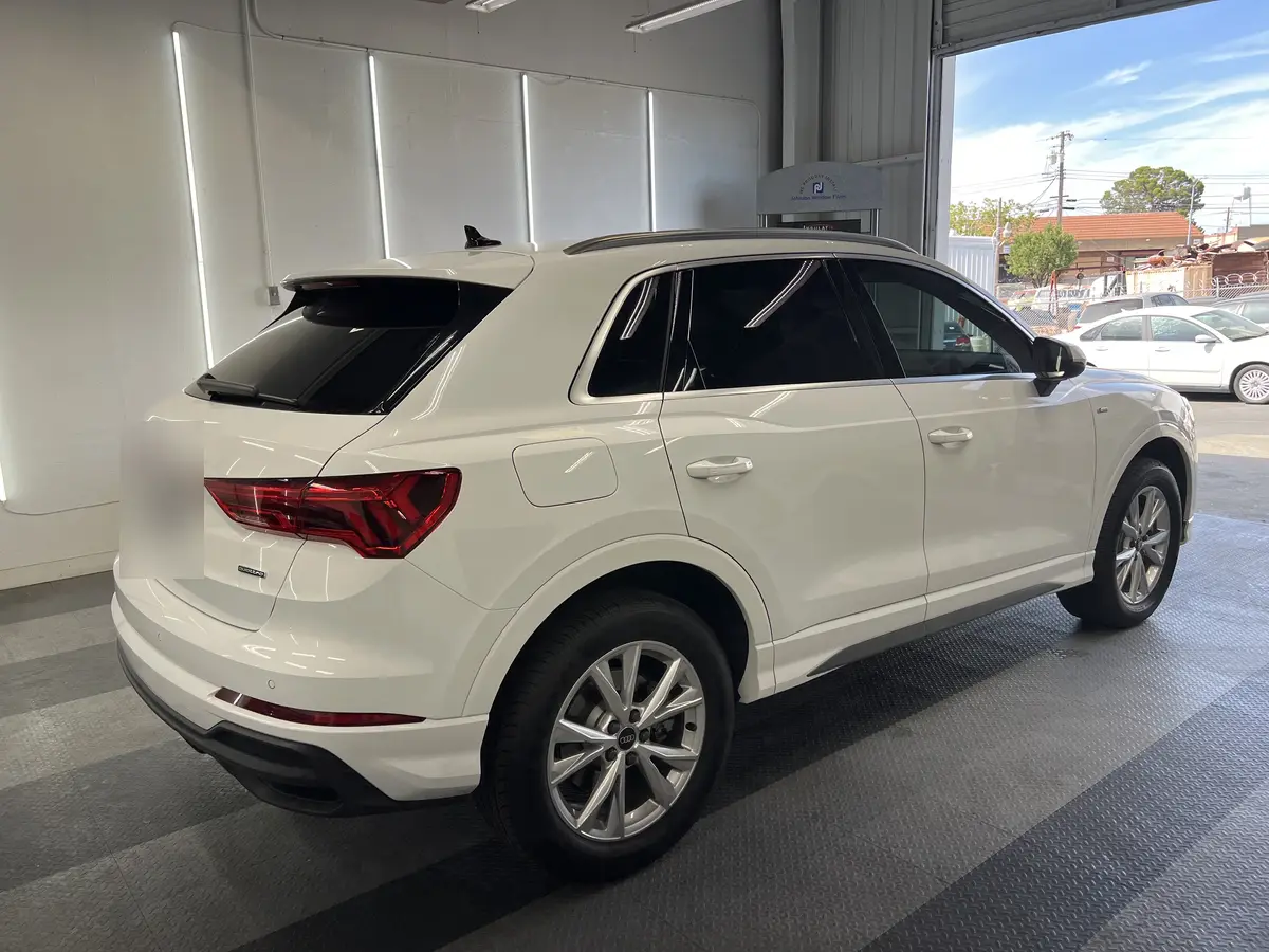 White Audi Q3 after Avery Dennison Encore Supreme ceramic window tint (view 1)
