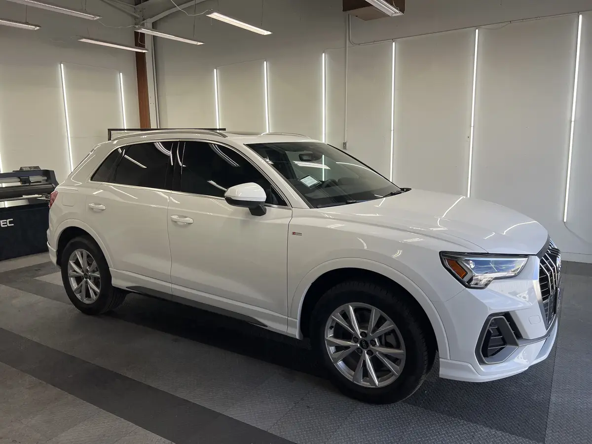 White Audi Q3 after Avery Dennison Encore Supreme ceramic window tint (view 3)