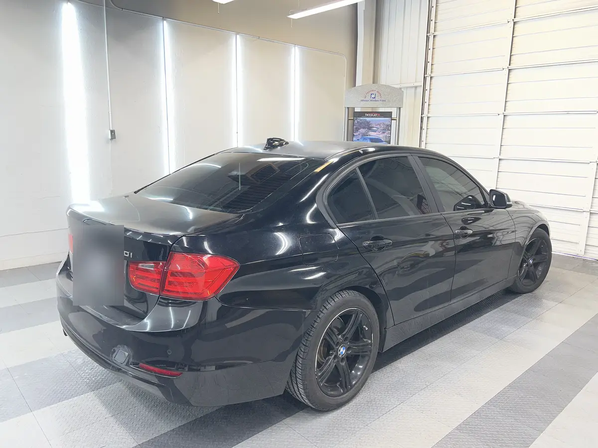 Black BMW 3 Series after Avery Dennison Encore Supreme ceramic window tint (view 1)