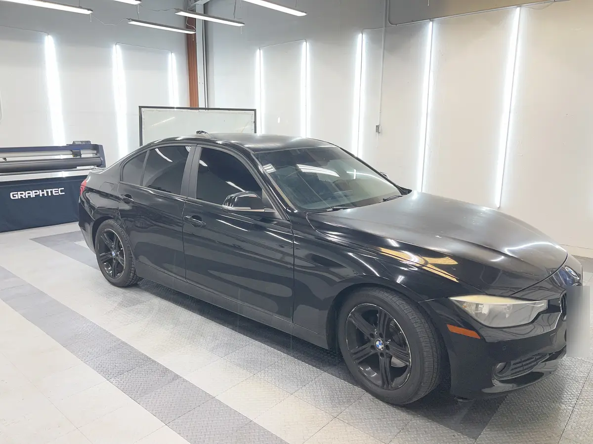 Black BMW 3 Series after Avery Dennison Encore Supreme ceramic window tint (view 2)