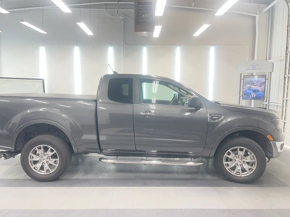 Gray Ford Ranger before window tinting, factory glass (view 1)