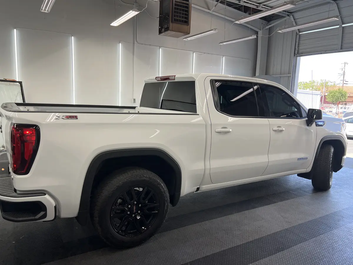 White GMC Sierra 1500 after Avery Dennison Encore Supreme ceramic window tint (view 3)