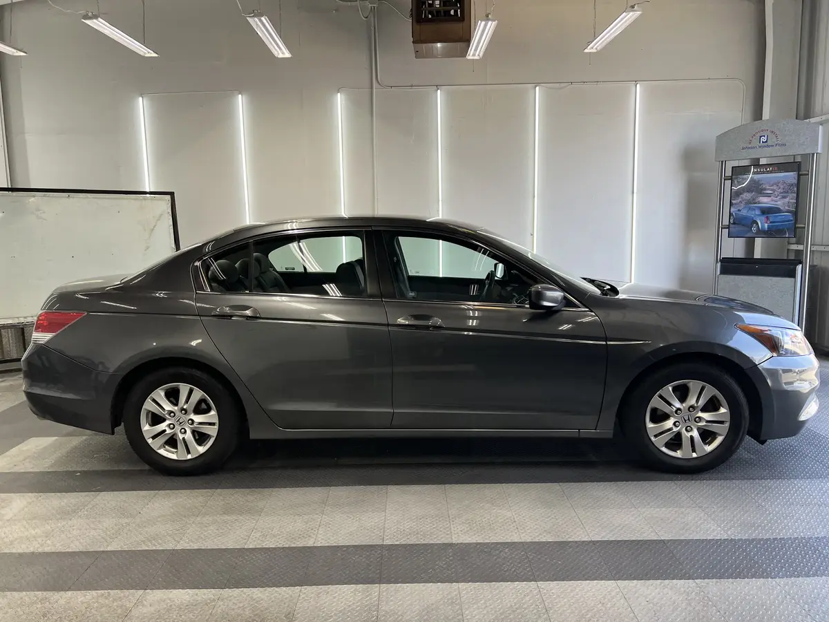 Gray Honda Accord before window tinting, factory glass (view 2)