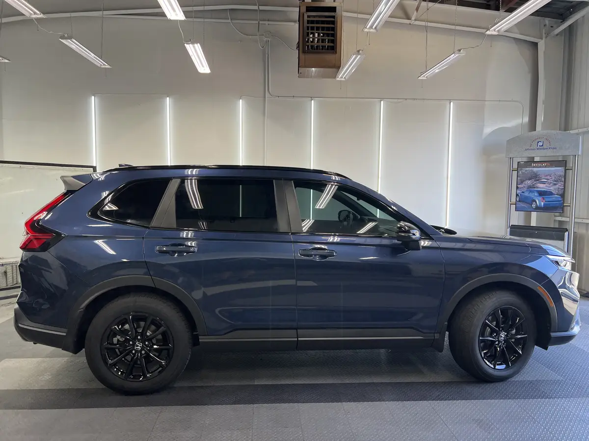 Blue Honda CR-V after Avery Dennison Encore Supreme ceramic window tint (view 2)