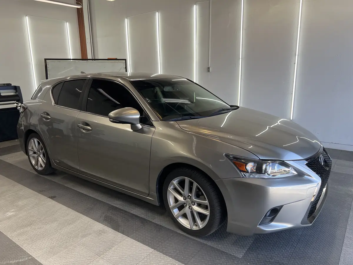 Silver Lexus CT 200h after Avery Dennison Encore Supreme ceramic window tint (view 1)