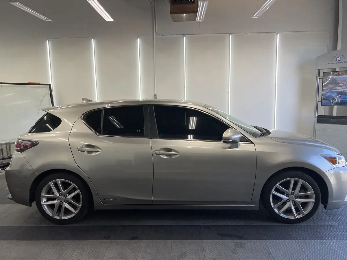 Silver Lexus CT 200h after Avery Dennison Encore Supreme ceramic window tint (view 2)