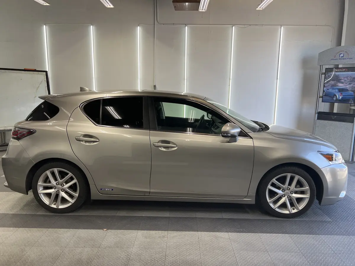 Silver Lexus CT 200h before window tinting, factory glass (view 2)