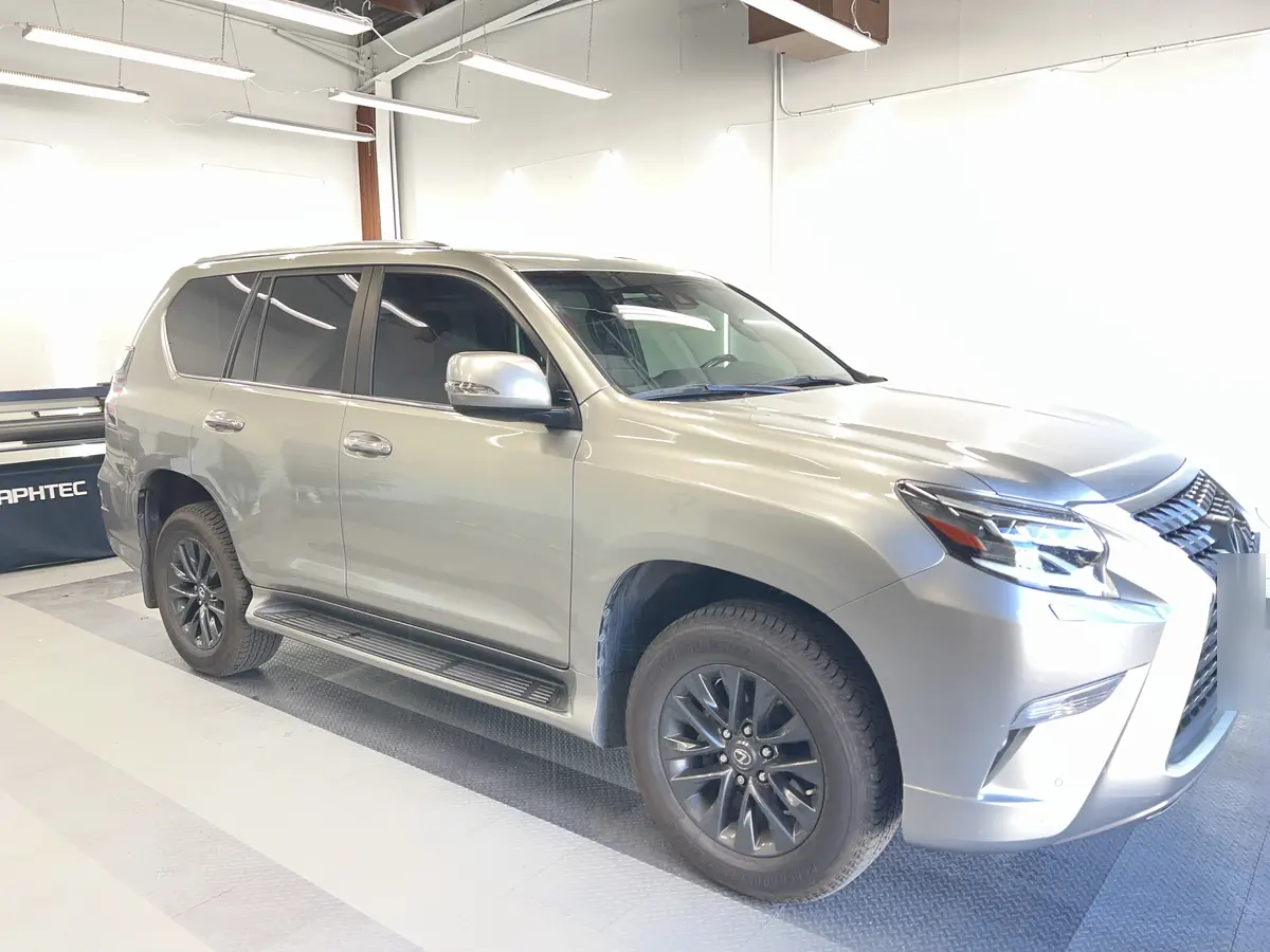 Silver Lexus GX after Avery Dennison Encore Supreme ceramic window tint (view 1)