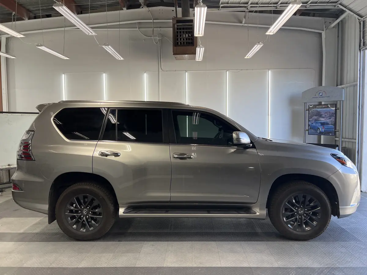Silver Lexus GX after Avery Dennison Encore Supreme ceramic window tint (view 2)