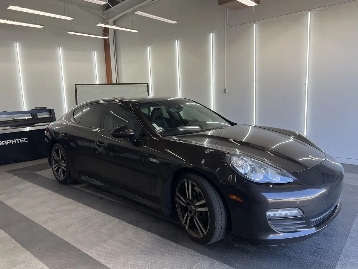 Black Porsche Panamera after Avery Dennison Encore Supreme ceramic window tint (view 1)