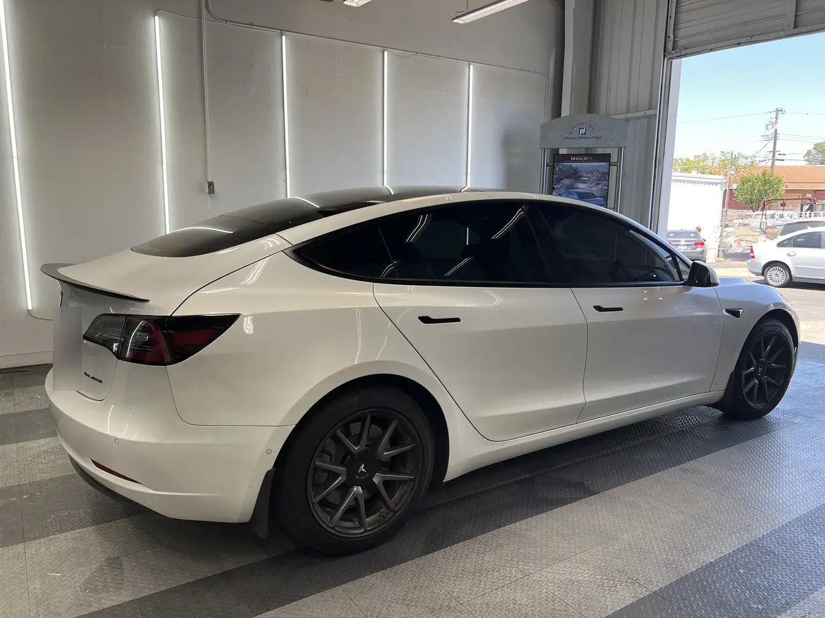 White Tesla Model 3 after Avery Dennison Encore Supreme IR ir ceramic window tint (view 1)