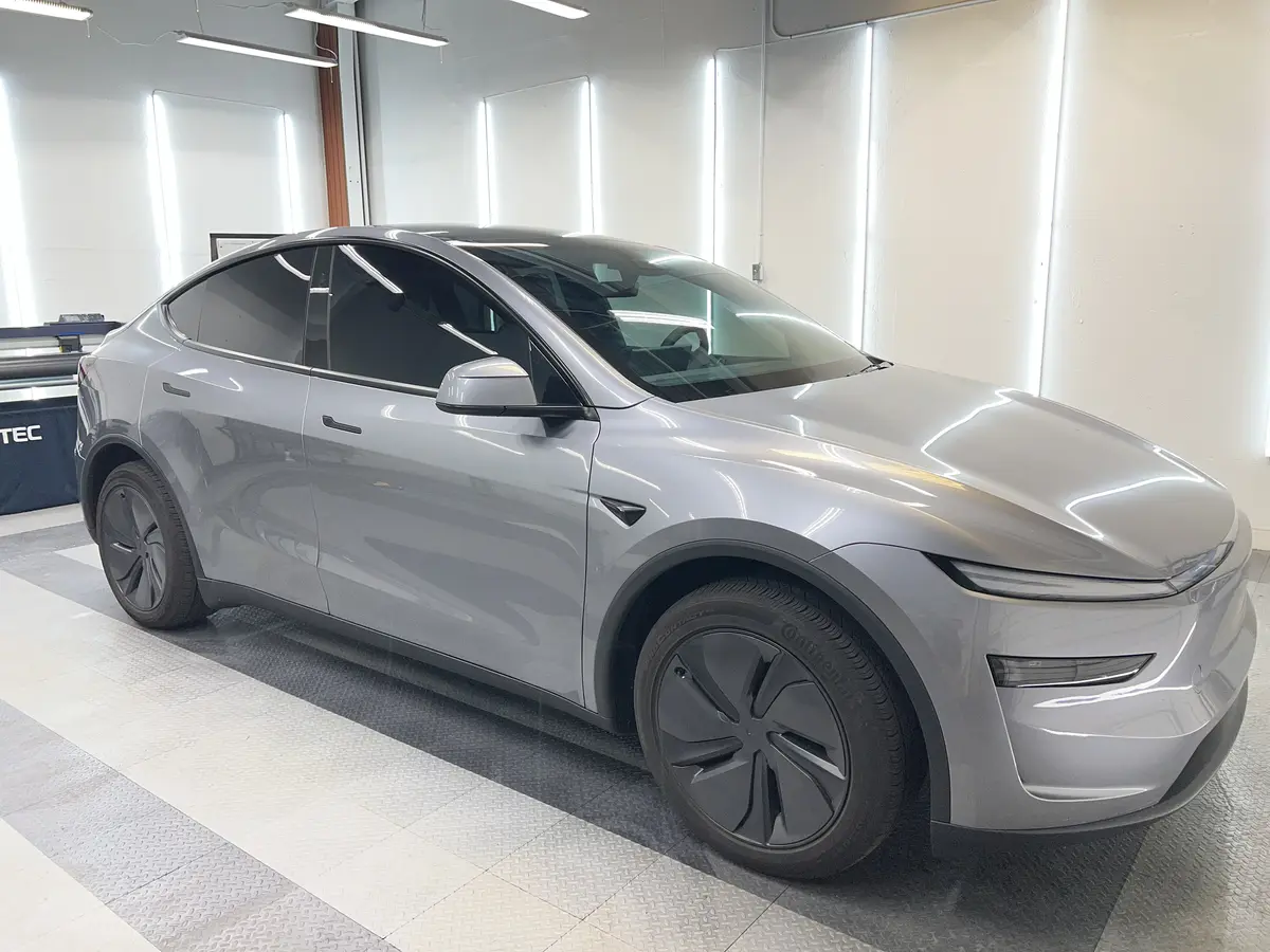 Silver Tesla Model Y after Avery Dennison Encore Supreme IR ir ceramic window tint (view 1)