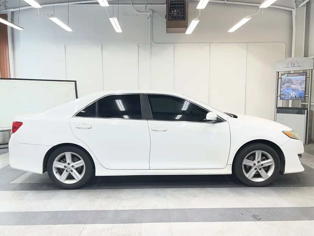 White Toyota Camry after Avery Dennison Encore Supreme ceramic window tint (view 2)
