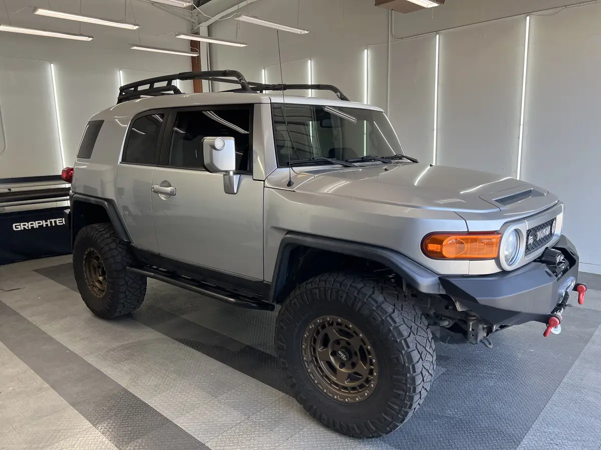 Silver Toyota FJ Cruiser after Avery Dennison Encore Supreme ceramic window tint (view 1)