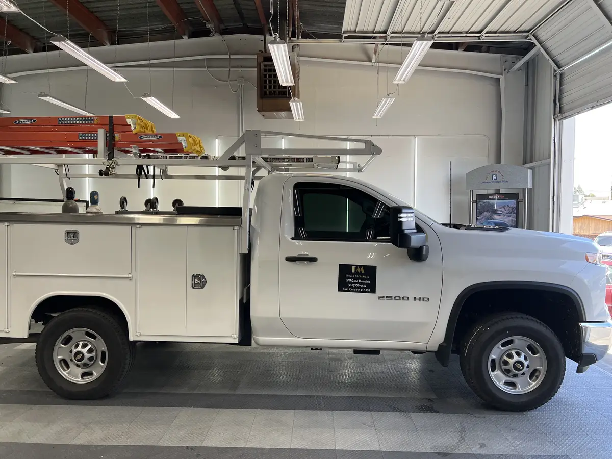 White Chevrolet Silverado 2500HD after Avery Dennison Encore Supreme ceramic window tint (view 2)