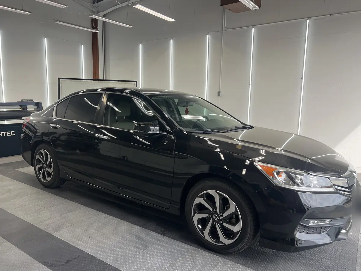 Black Honda Accord after Avery Dennison Encore carbon window tint (view 1)