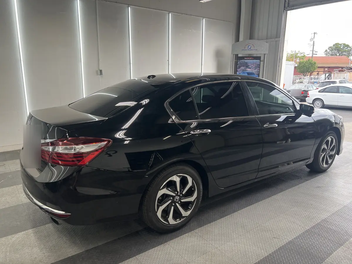 Black Honda Accord after Avery Dennison Encore carbon window tint (view 3)