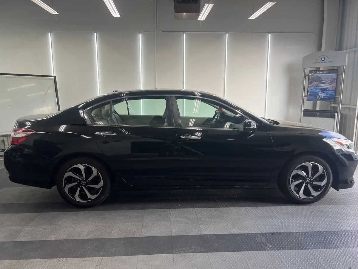 Black Honda Accord before window tinting, factory glass (view 2)