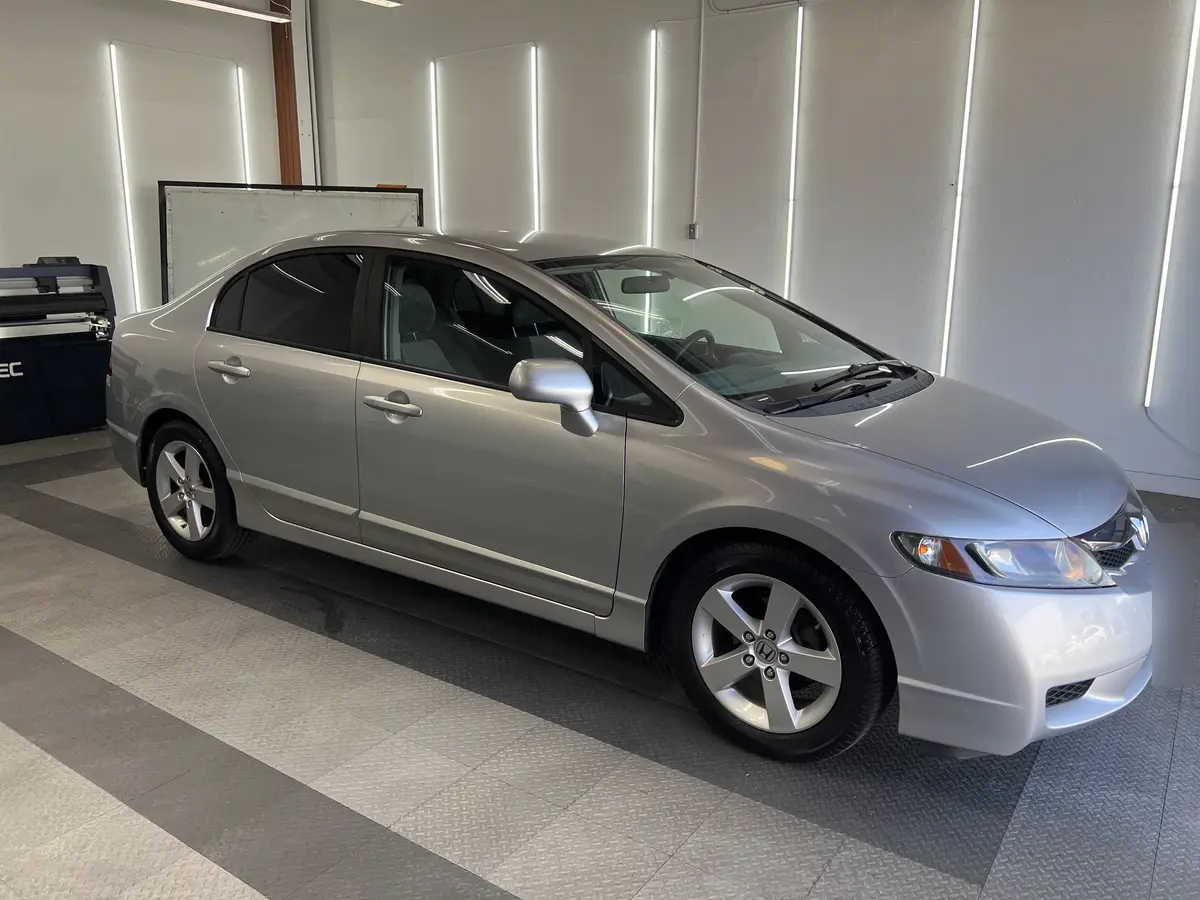 Silver Honda Civic after Avery Dennison Encore Supreme ceramic window tint (view 1)